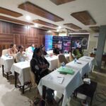 Medical practitioner administering a hyaluronic acid dermal filler injection during the IAMAC Dermal Fillers Workshop hands-on clinical session.